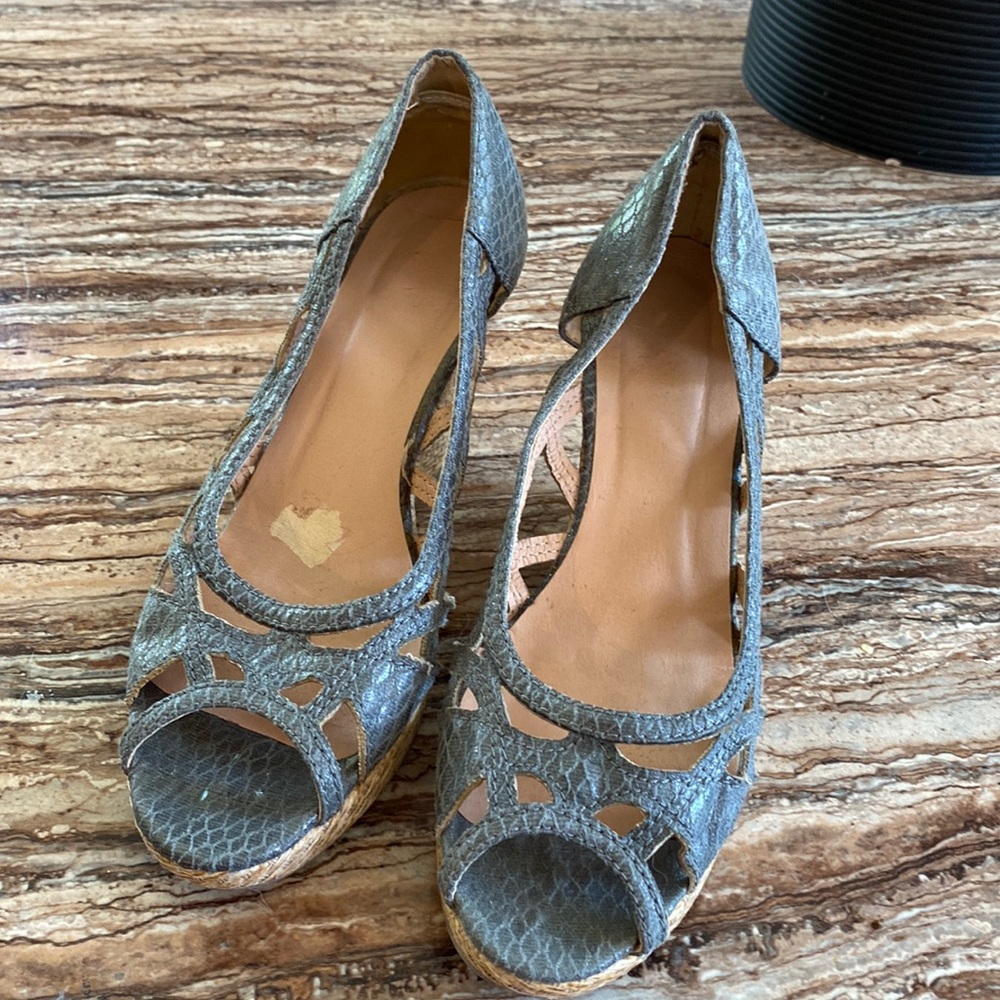 Ladies size seven espadrilles in gray with rattan wedge heel.